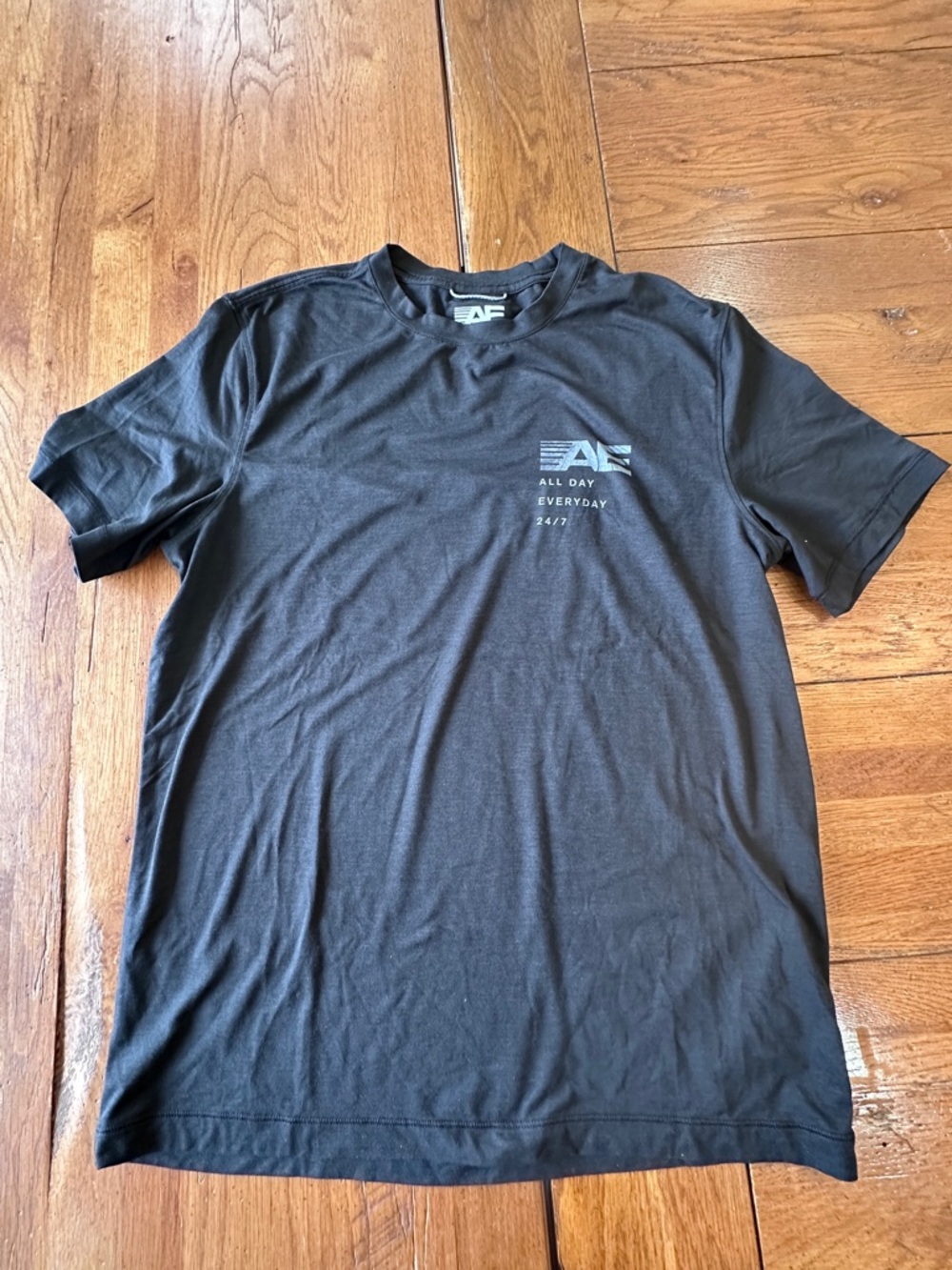 American Eagle Outfitters Black Crew Neck Tee with Small Chest Graphic